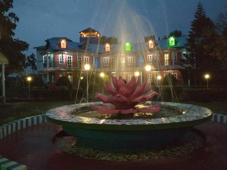 The beautiful fountain lit in night at the Sonar Bangla Resort, Lataguri, Jalpaiguri district, West Bengal