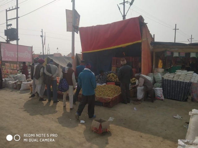 Shops selling fruits and groceries for the devotees staying in the Tent city — Kumbh Nagri
